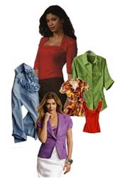 fashion tops for spring 2010 have ruffles, potrait necks, and roll up sleeves